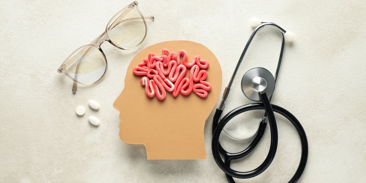 Perfil persona, fonendoscopio, pastillas y gafas